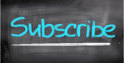 black chalkboard that says subscribe in blue letters